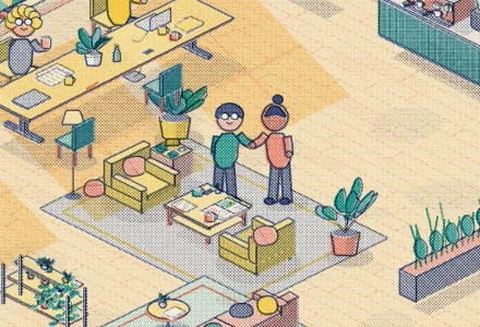 An interviewer and a candidate shaking hands in a coworking lounge.